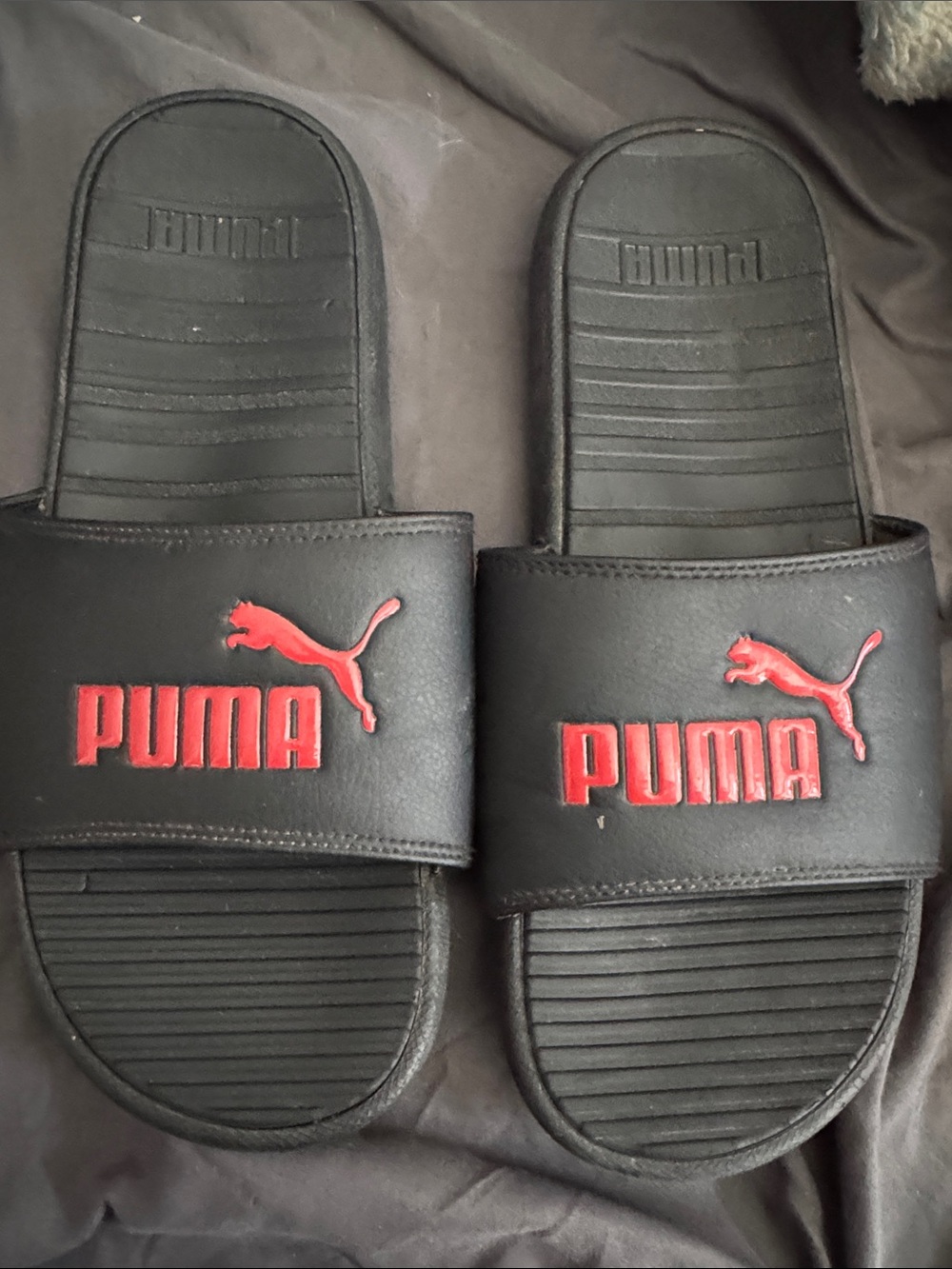 Puma Black Slides with Red Logo Accent